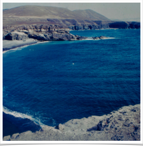Sheltered cove and cliffs at Playa de Ajuy.
